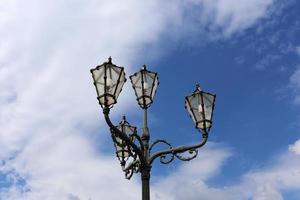 Lantern - a device for lighting the street at night photo