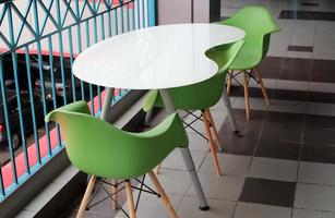 Chair and table in a cafe on the Mediterranean coast photo