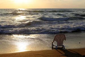 Chair on the Mediterranean Sea photo