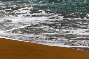 Sandy beach on the Mediterranean Sea photo