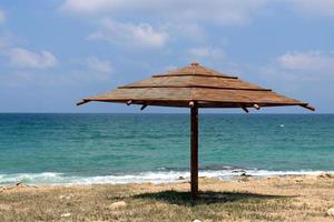 Canopy from the sun on the city beach photo