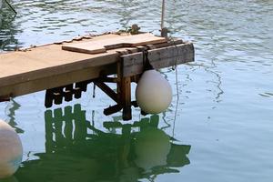 Berth on the seashore for mooring boats and yachts photo