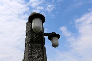 Lantern - a device for lighting the street at night photo