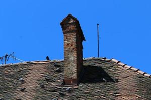 Roof on an old village house in Belarus photo