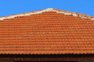 Red tiled roof on a residential building in Israel photo