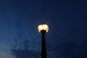 Lantern - a device for lighting the street at night photo