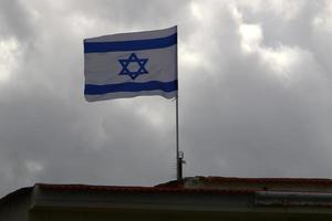 Israeli blue and white flag with the Star of David photo