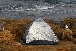 Tourist tent on the Mediterranean coast. photo