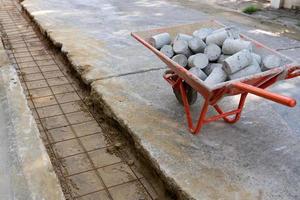 Worker Measure Level of Concrete Slab Wire Mesh That Used For Structural Reinforcement of Road photo