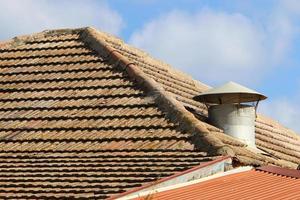 Red tiled roof on a residential building in Israel photo