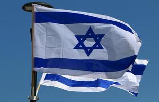 Israeli blue and white flag with the Star of David photo