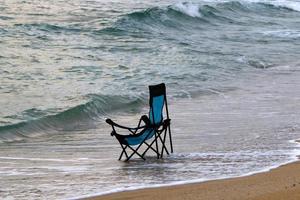 Chair on the Mediterranean Sea photo