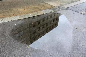 Sidewalk for pedestrians in a big city photo