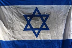 Israeli blue and white flag with the Star of David photo