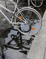 Bicycle stands on the street in a big city photo