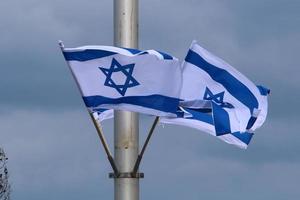 Israeli blue and white flag with the Star of David photo