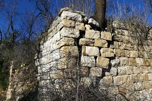 Stone wall of ancient Crusader fortress photo