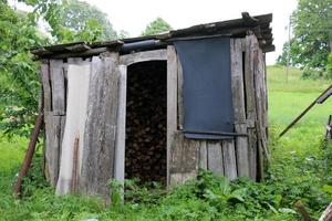 Firewood is prepared to heat the stove in the house in winter. photo