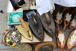 Antiques and tools are sold at the flea market photo