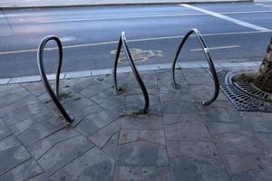 Sidewalk for pedestrians in a big city photo