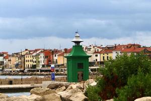 Lighthouse - a means of navigational equipment on the coast of large reservoirs photo