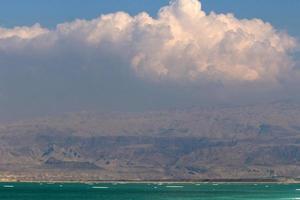 The Dead Sea is a salt lake between Israel, Jordan and the West Bank of the Jordan River. photo