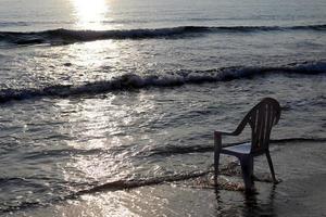 Chair on the Mediterranean Sea photo