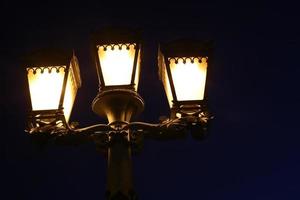 Lantern - a device for lighting the street at night photo