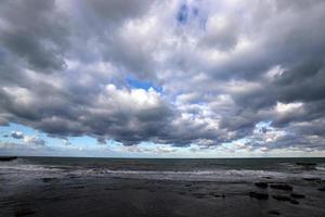 Thunderclouds in the sky over the mediterranean sea photo