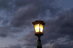 Lantern - a device for lighting the street at night photo