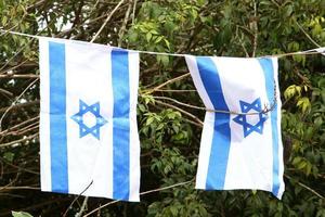 Israeli blue and white flag with the Star of David photo