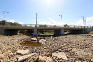 Reinforced concrete bridge over the river photo