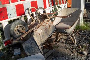 old rusty wheelbarrow photo