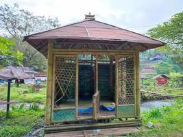 a simple place of worship by the river photo