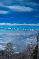 landscapes of the Piedmontese Langhe under the white snow, in the winter of 2022 photo