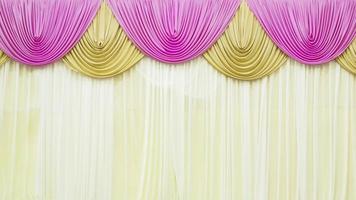 Pink and yellow stage curtain decoration background photo