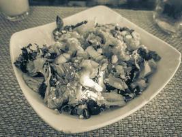 Plate of salad in restaurant PapaCharly Playa del Carmen Mexico. photo