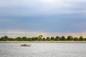 Wadden sea tidelands coast beach water landscape Harrier Sand Germany. photo