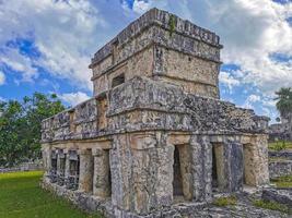 Ancient Tulum ruins Mayan site temple pyramids artifacts seascape Mexico. photo