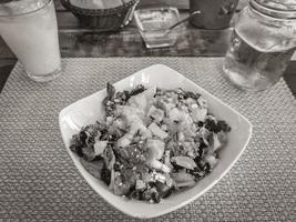 Plate of salad in restaurant PapaCharly Playa del Carmen Mexico. photo