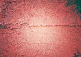 Rough concrete wall texture, dark red vignette, vintage style, can be used as background and wallpaper. photo