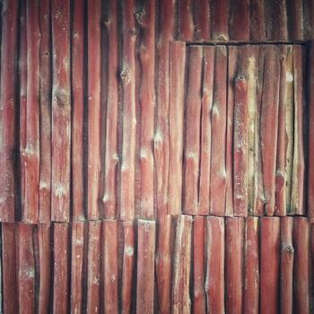 Dark brown old wood texture pattern of the exterior wall cladding.  Vintage style vignette  Use it as wallpaper and background. photo