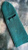 Handmade balaclava with Ukrainian symbols. Knitted from gray and green threads. Warms, reliably saves from the cold. photo