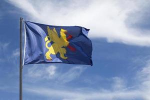 Flag of Saint Brieuc waving in mid air photo