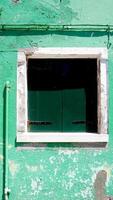 green Window and white frame photo