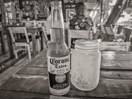 Playa del Carmen Quintana Roo Mexico 2022 Corona beer bottle in restaurant PapaCharly Playa del Carmen Mexico. photo