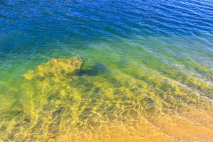 Green blue turquoise water beautiful quarry lake dredging pond lake. photo