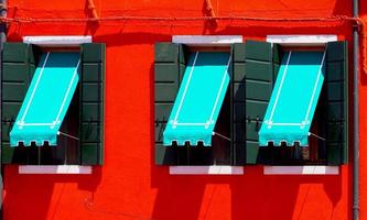 three Windows with blue canopy photo