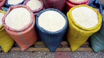 Rice in colorful pastel sack photo