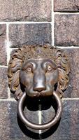 lion door handle at cityhall in stockholm photo